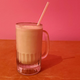 Vegan milkshake in a glass on a tabletop
